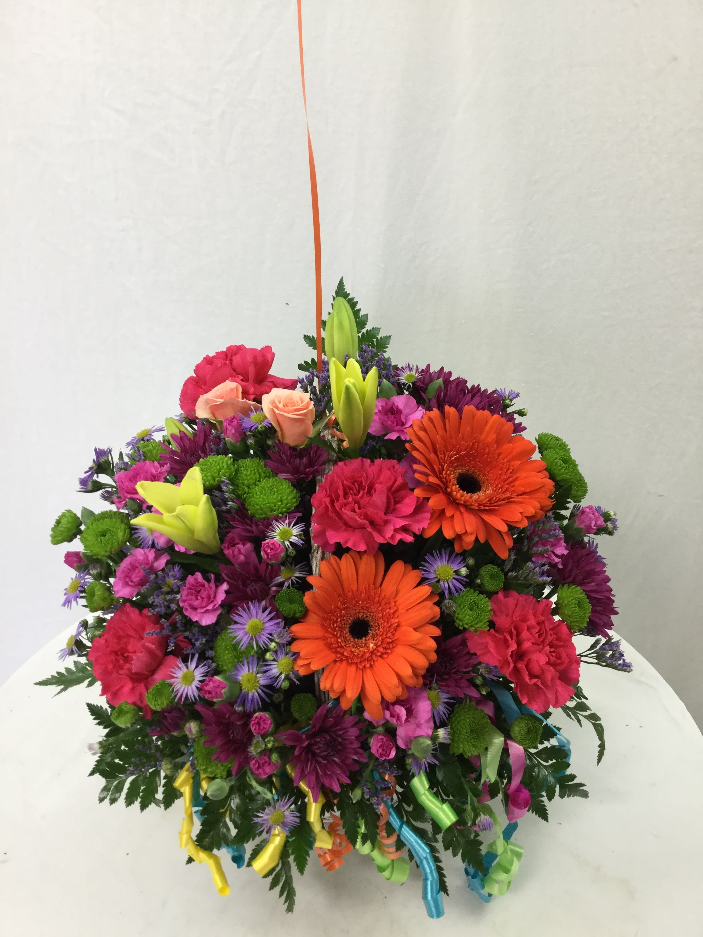 Birthday Bash Bouquet - Celebrate their big day with this beautiful birthday bouquet. Includes a wide array of fresh blooms, fresh greens, and includes ribbons.