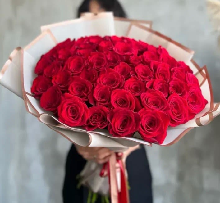 Red Rose Bouquet - This stunning bouquet is full of fresh red roses and hand-crafted and designed with elegance and love in mind!