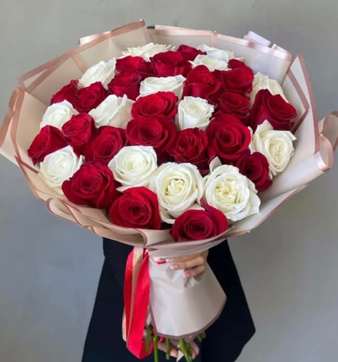 Red and White Rose Bouquet - This handcrafted rose bouquet is full of fresh red and white roses. Elegant and beautiful. Makes for a perfect gift to a loved one.