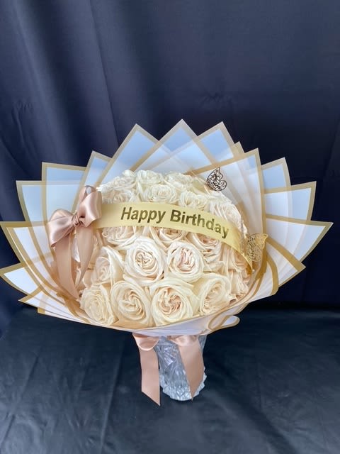 Elegant Handtied Birthday Bouquet - This stunning bouquet is handled with love and care. It is handcrafted with 30 beautiful roses, an elegant bow, a birthday banner and a beautiful butterfly. Handtied to perfection. 