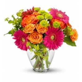 Fun Summer Bouquet - Bright flowers will always put a big smile and warm the heart of anyone you love.  This arrangement is beautiful and full of color to brighten up any room or office. 