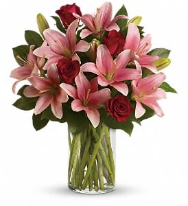 Lily and Rose Embrace - This beautiful arrangement comes with fresh and fully bloomed pink lilies and beautiful, imported roses. 