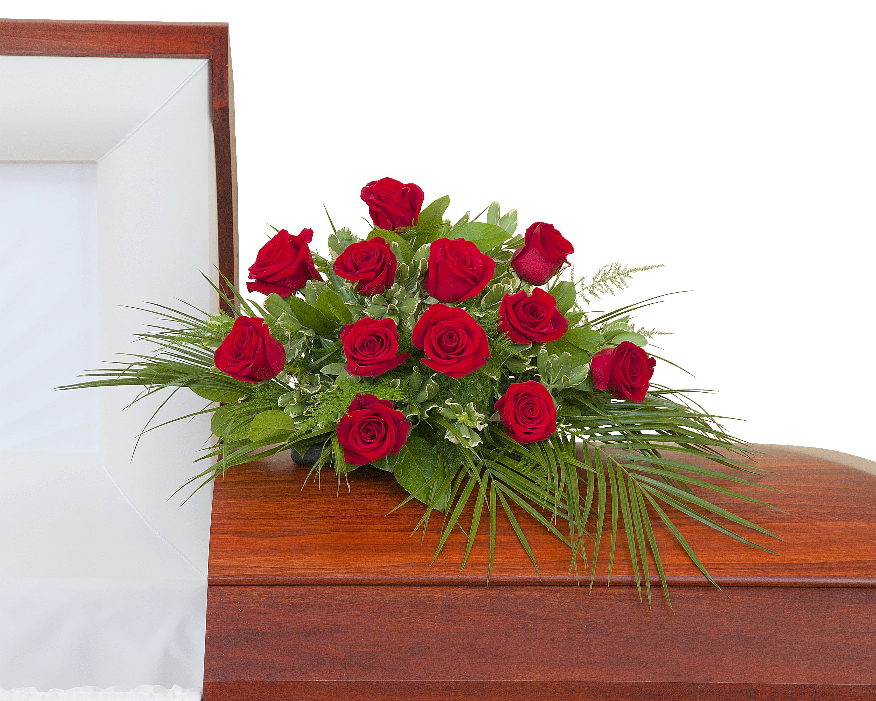 Simply Stated Casket Spray - One dozen Roses in a casket spray.	Approximately 16" wide 12" deep