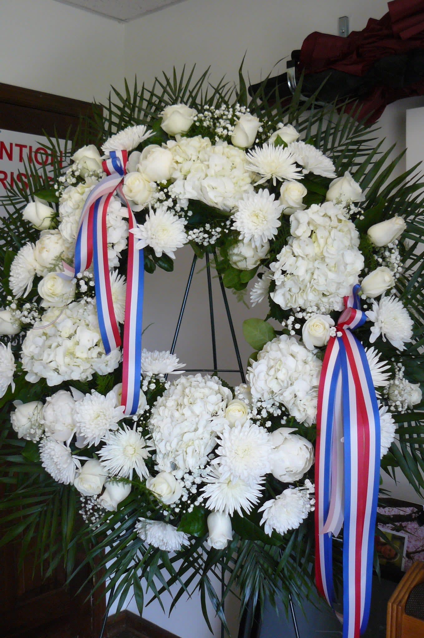 All White Sympathy Spray  22 Inch Wreath   (Click on Picture for Best View) - Peonies(Sesasonal), Roses, Cremons, Mums, Hydrangea, Babies Breath, Ferns Fancy Greens, Ribbon.  Call Store  for Details 908-234-2900