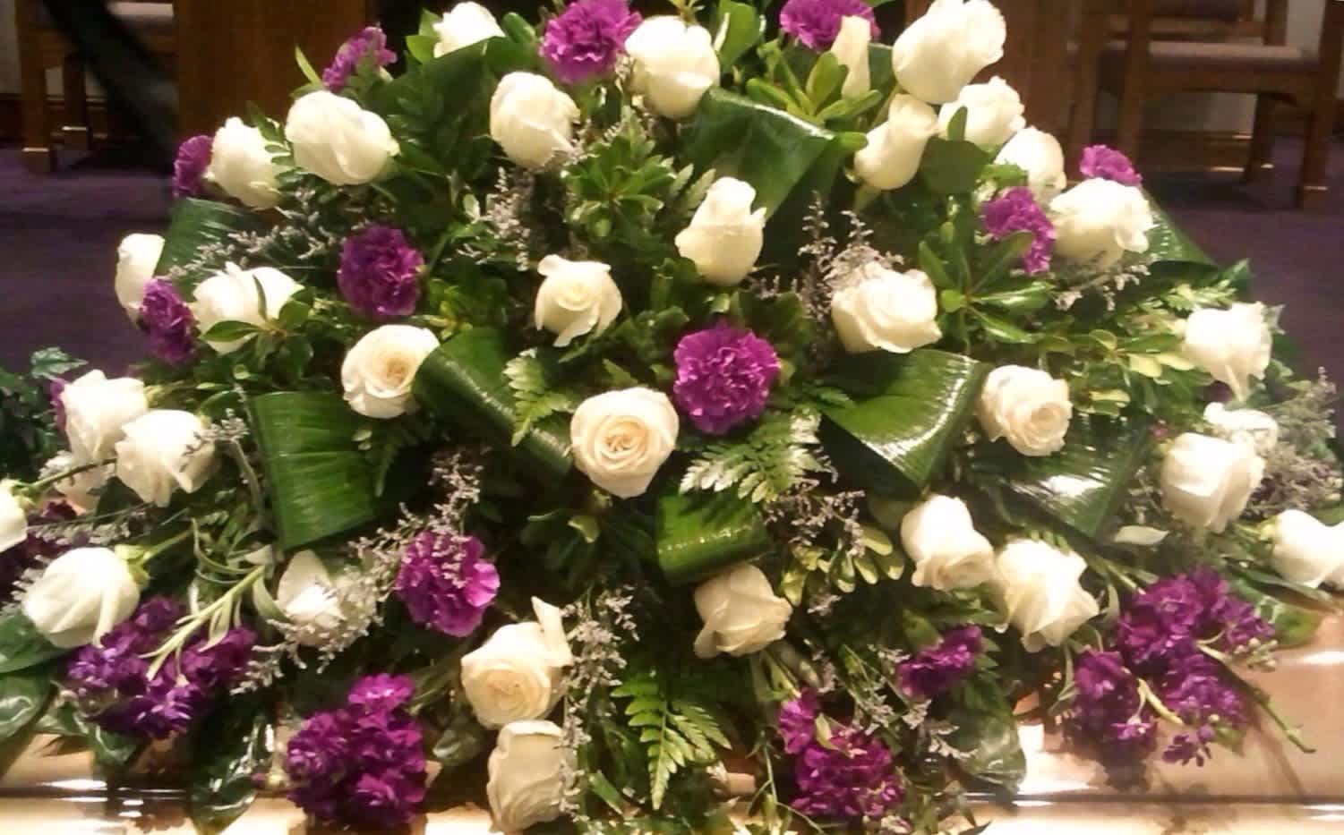 Casket Spread - Royaly Colors in a Double Saddle casket spread that is centered on your casket during the loss of a loved one.