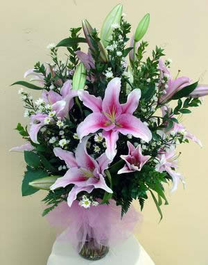 Acapulco Lilies  - Fragrant Acapulco lilly vase arrangement.   (14"w x 22"h) 
