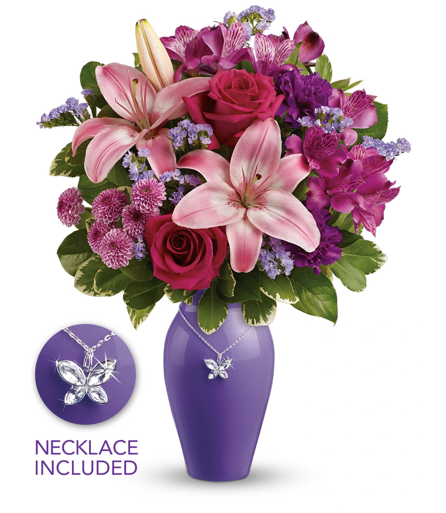 Pink lilies and roses with purple flowers in a purple vase with a butterfly necklace.