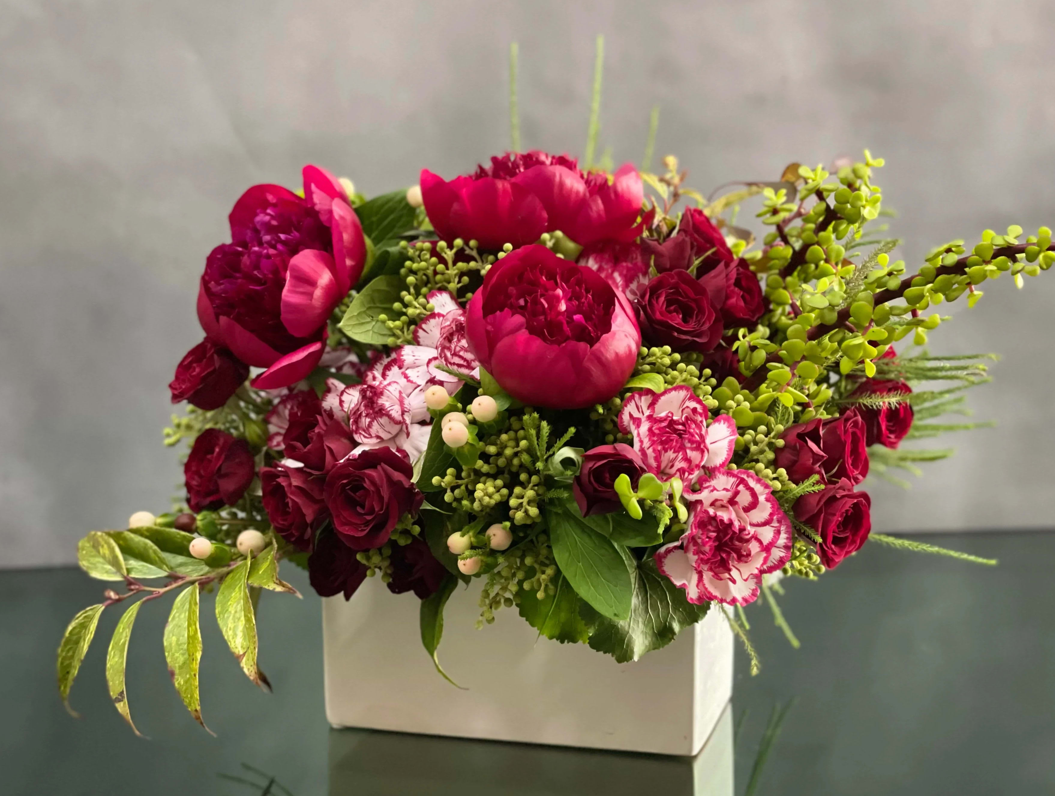 Peppermint Patty - Pasadena Florist  - This petite ceramic box includes fresh peonis, spray roses, dutch carnations, coffee beans and seasonal greens