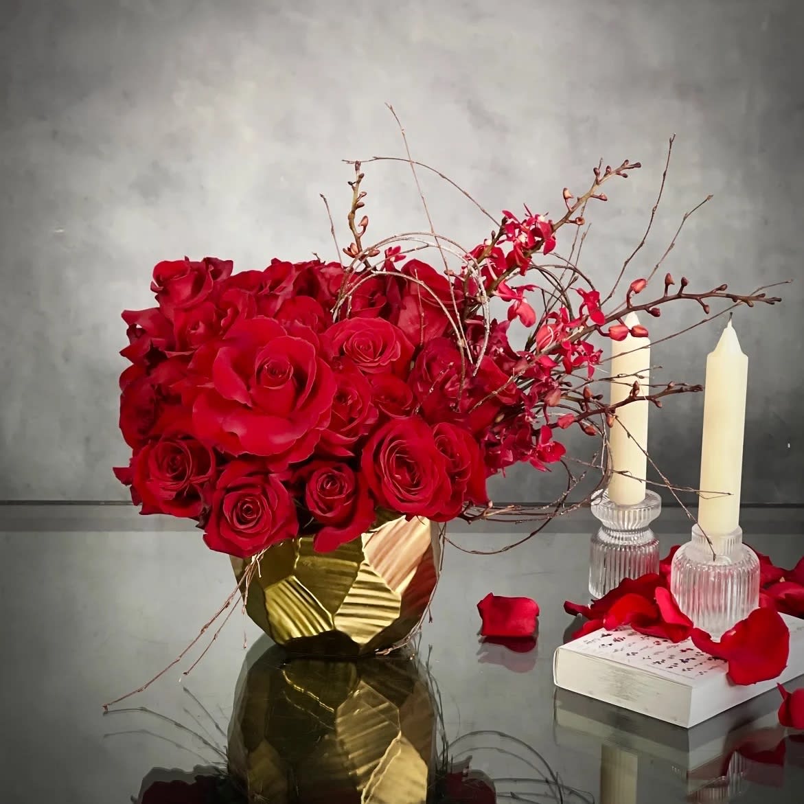 Red Passion Tango - Valentine Edition - A lovely Gold Geometric vase holds this luscious arrangement of about 50 over various Red Rose and Exotic Orchid blooms. Elegant and oh so special.  Measurement  15" Round and 13" Tall