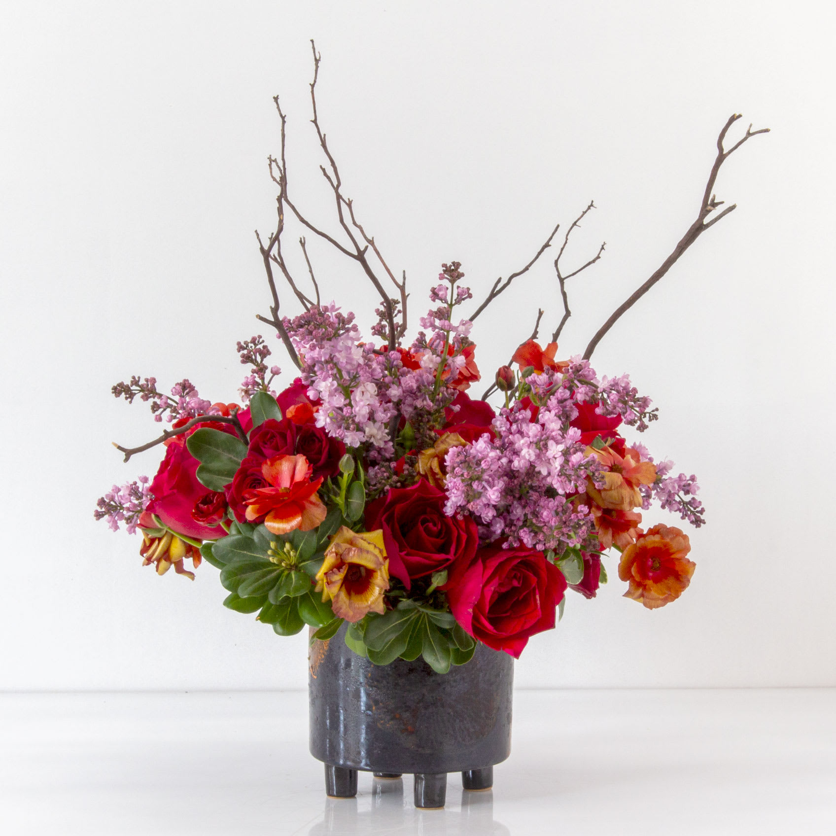 Ray of Reds - Red Roses and Butterfly Ranunculus  with other locally grown Seasonal Flowers Approx.: 16" 