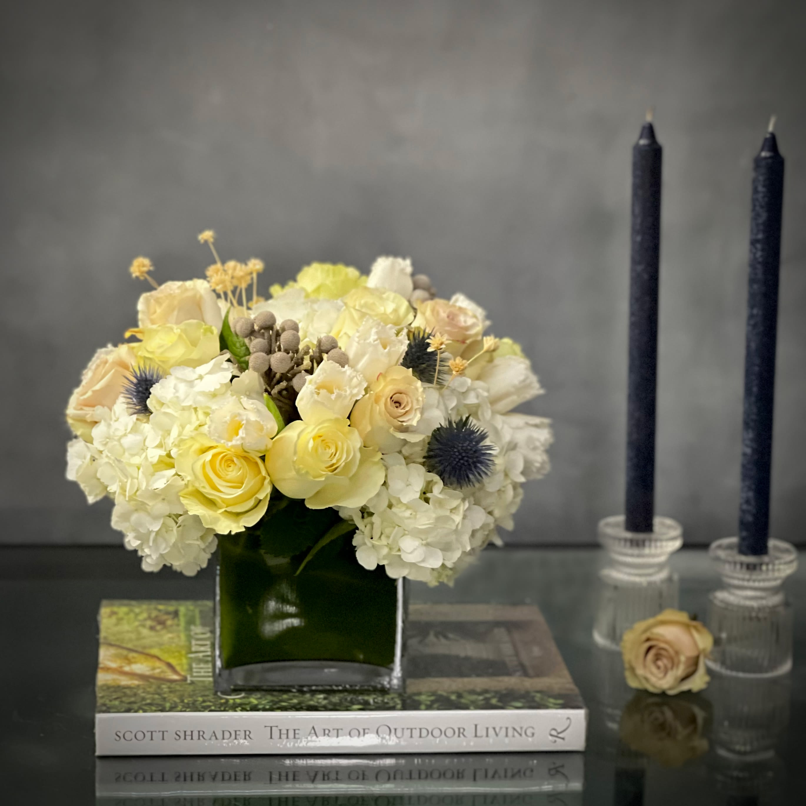 Roses And Thorns  - Our beautiful arrangement consists of White Roses, Hydrangeas, Thistles, Cream Roses placed within a glass square vase. Wonderful for a Thank You, Just Because or Thinking Of You. 