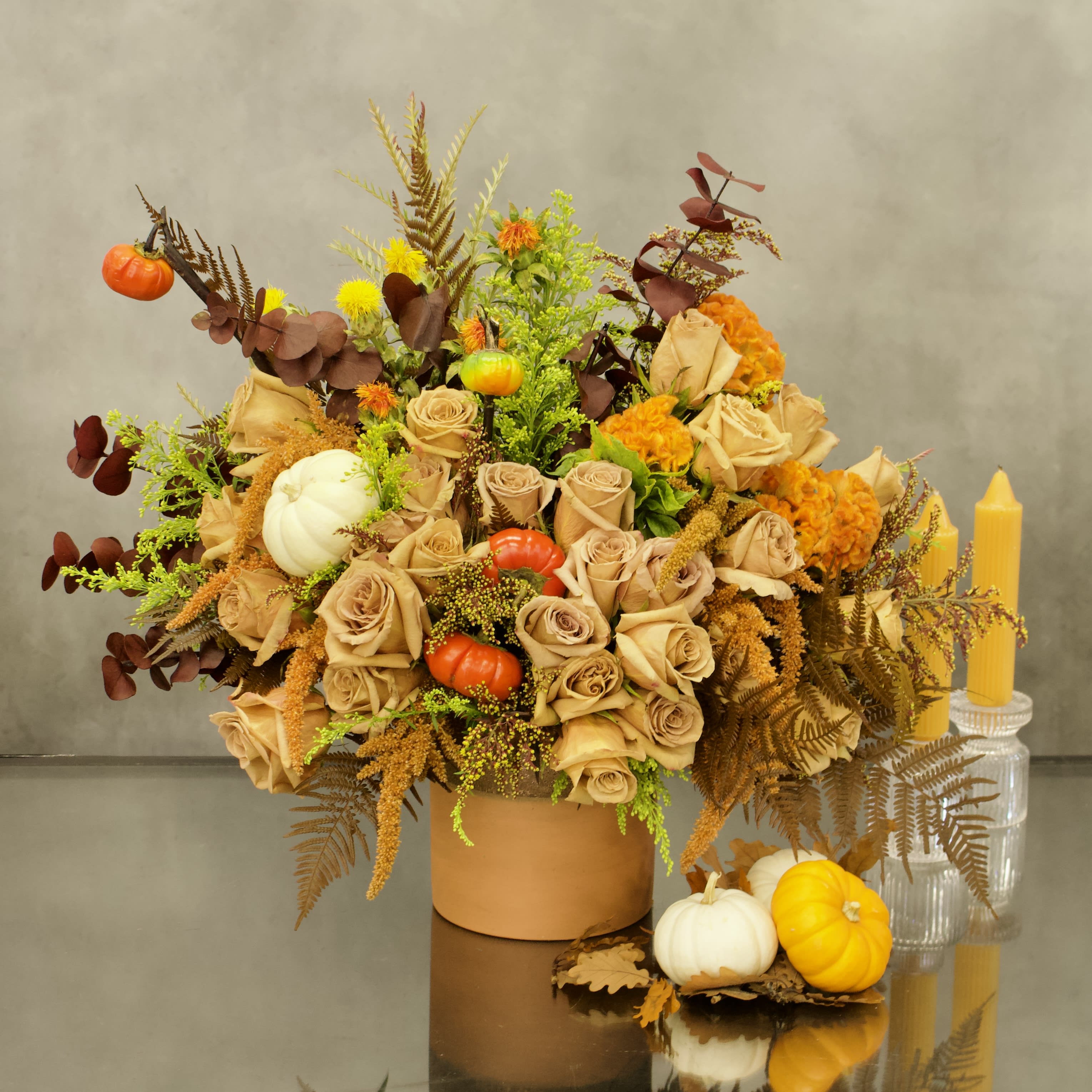 Designers Choice - Fall  - Let our talented designers design an arrangement for you with the freshest seasonal flowers. Pictured is just an example of one of our Fall arrangements.