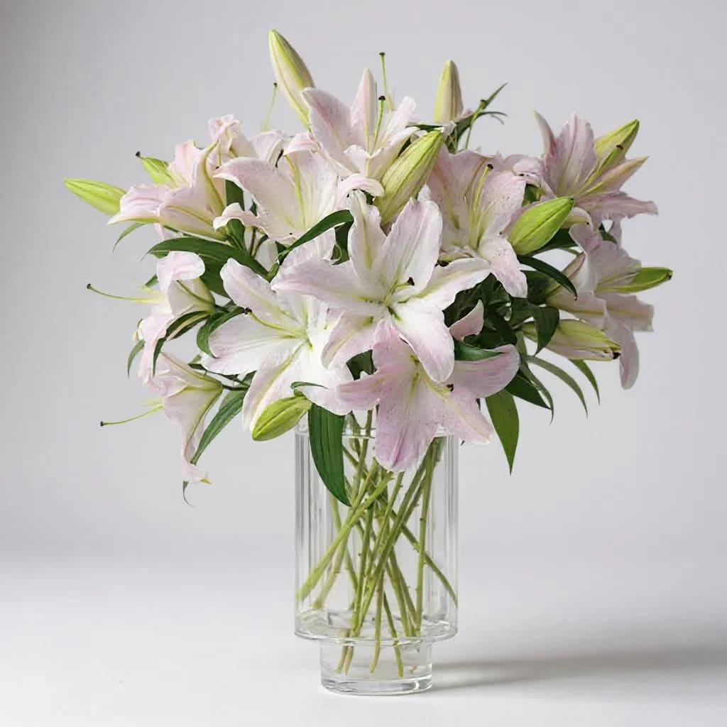Ooh-La-La Lilies - This dramatic design features pink Oriental lilies nestled in pink "crushed ice." Ooh-la-la!