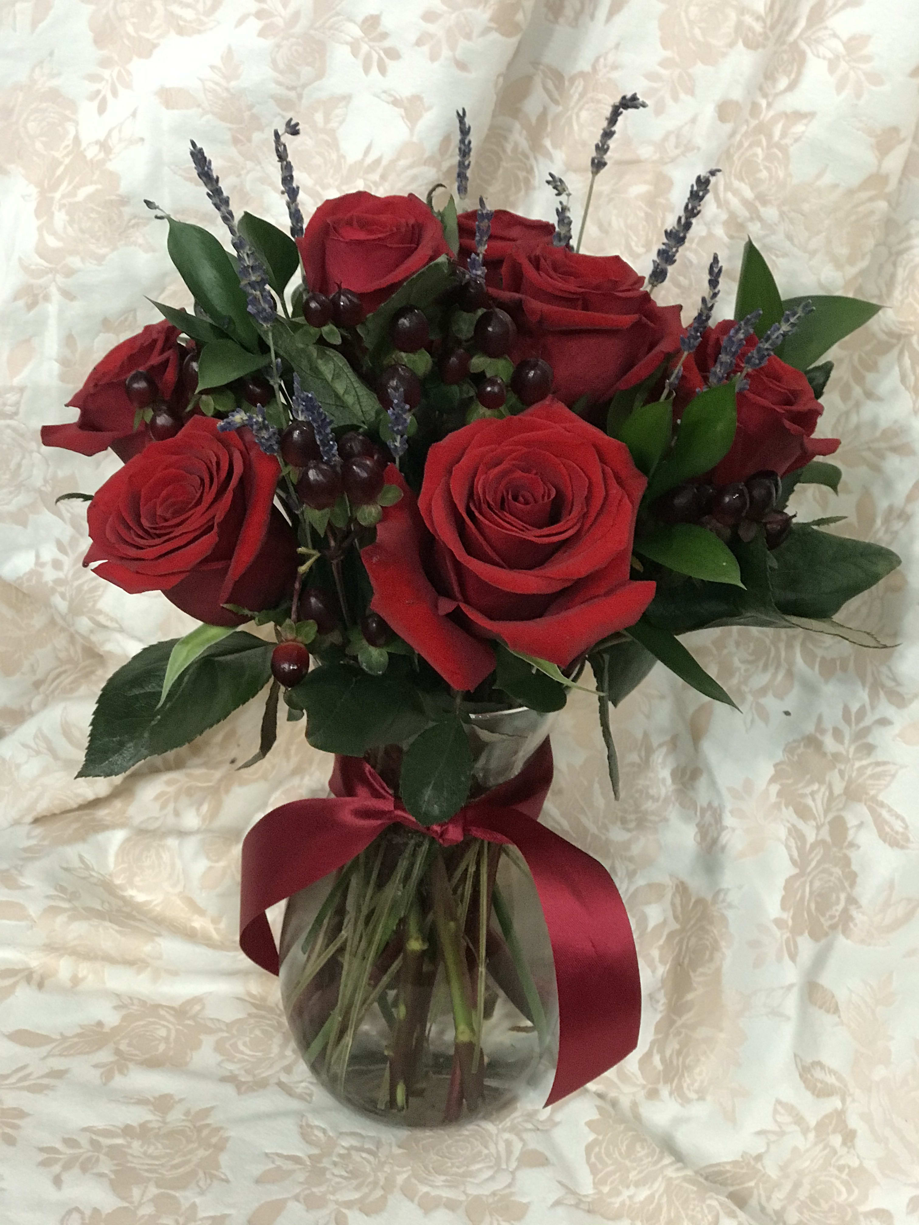 Grateful for your Love - Deep red Premium Roses with large blooms, beautifully accented with upscale greenery and splashes of lavender.