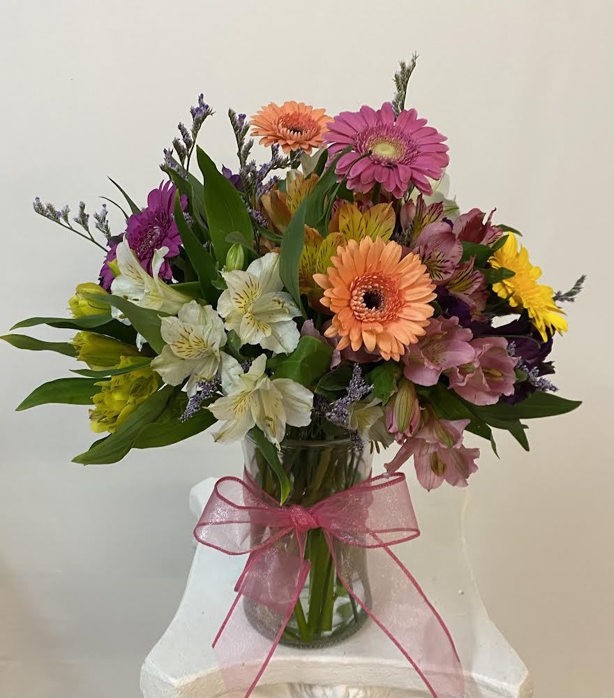 Blended Beauty  - Give a colorful assortment of fresh alstroemeria and mini gerbera daisies, vased with fillers and greenery. 