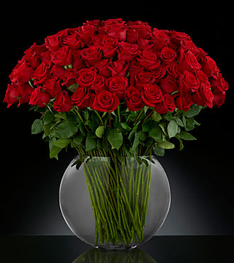 FTD Breathless Luxury Rose Bouquet - They leave you breathless with every kiss. Sweep them off their feet with 24-inch premium long-stemmed red roses. Each stem flaunts the beauty of their beautiful swirling petals, gorgeously situated in a sophisticated clear glass 13-inch pillow vase, to astound and amaze your special someone with the bounty of their timeless elegance. Includes: 100 Red 60cm roses, one large glass pillow vase. ( vase subject to change depending on availability. ) 