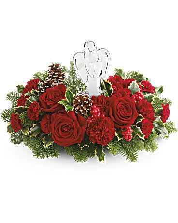 Red rose centerpiece with an angel figurine and pinecones