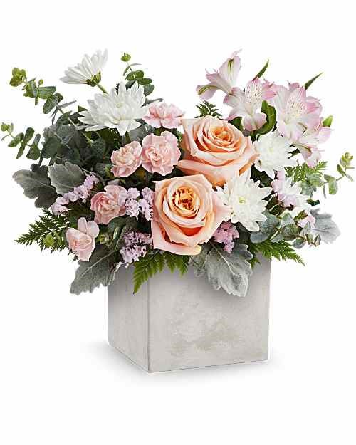 Sweet Petals - Peach and blush roses cue a soft, romantic first impression in this Sweet Petals flower arrangement - a birthday bouquet, anniversary surprise, or thinking-of-you gift that feels like a gentle garden in a compact square vase. The combination of pink, white, and peach tones is airy and comforting, so the person you're sending it to will feel warmly noticed and quietly celebrated.  