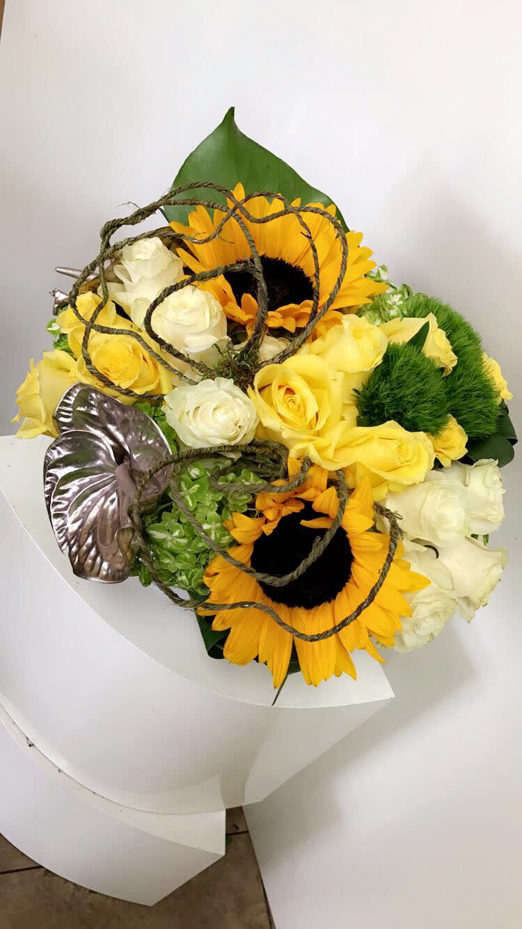 Sunshine - Abstract arrangement featuring beautiful sunflowers and roses. 