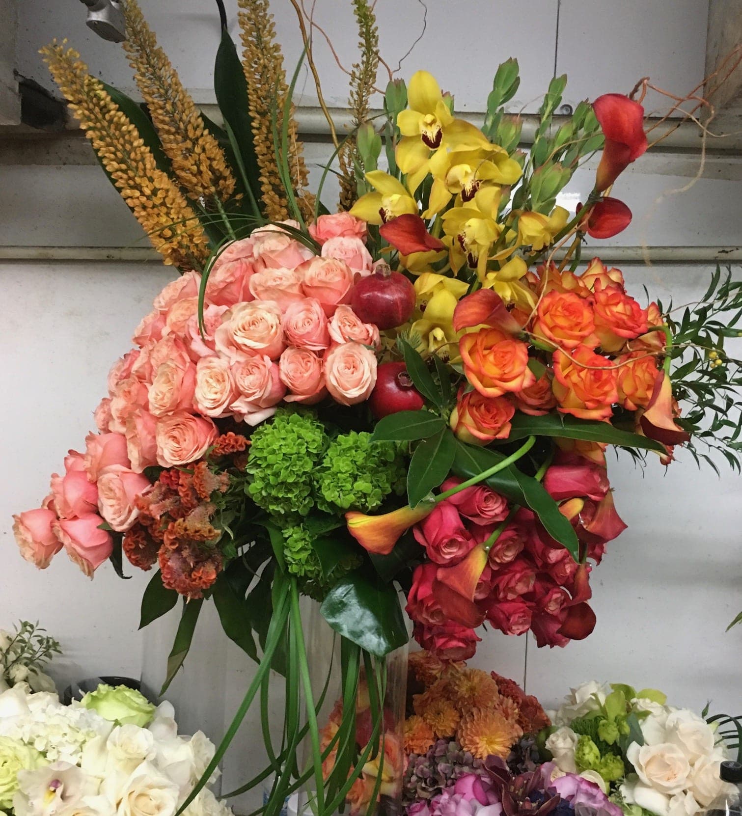 Large mixed bouquet with roses, orchids, and calla lilies