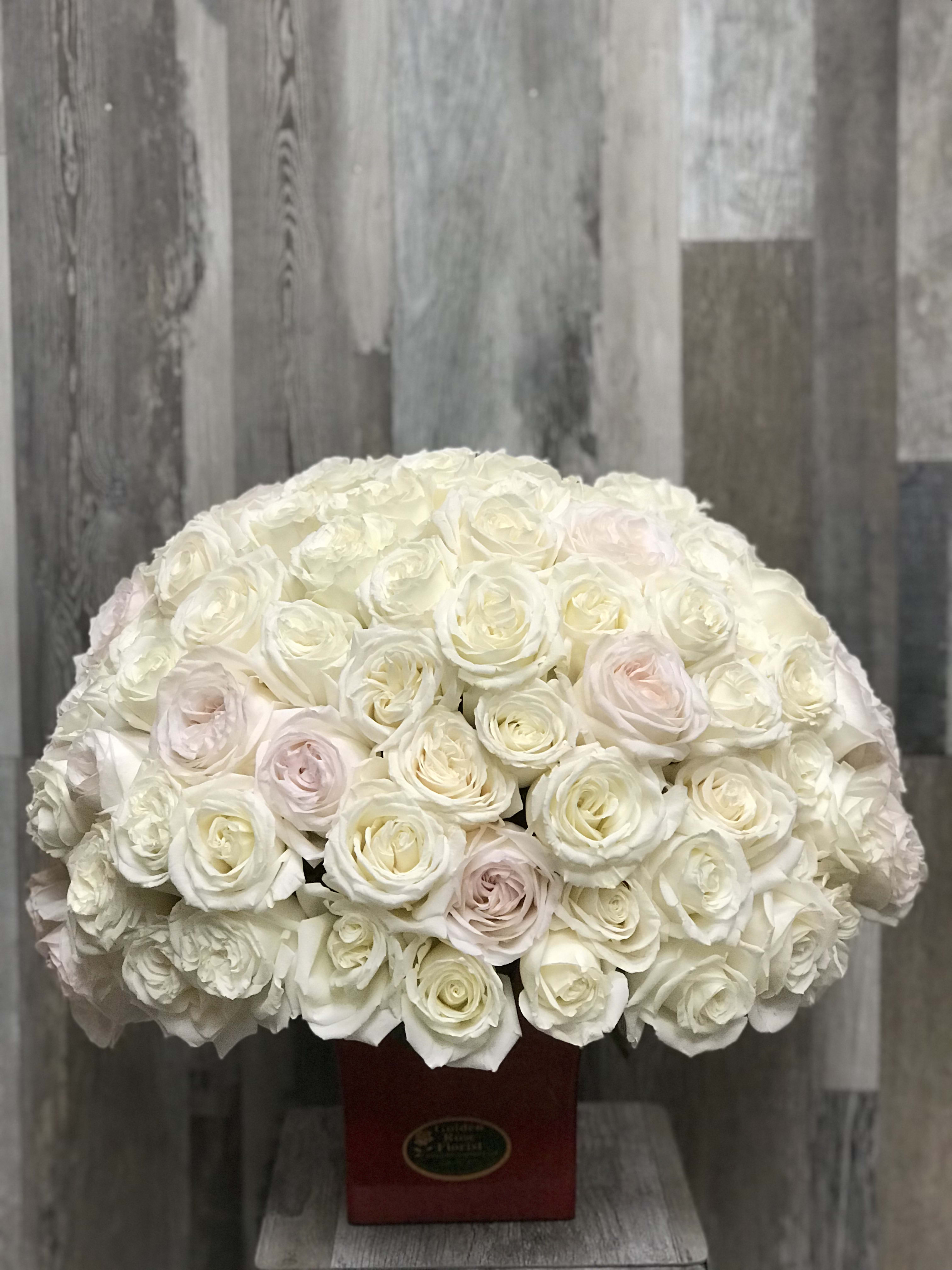 BDAY 1254 - Ecuadorian Garden Roses  AS SIMILAR AS POSSIBLE Each floral arrangement is custom-designed and handcrafted using the freshest flowers, containers, decorative accents, and materials available at the time of creation. Due to seasonal availability, immediate inventory conditions, market limitations, or unforeseen circumstances, substitutions of flowers, containers, or decorative elements may be necessary.  When substitutions occur, they will always be made with items of equal or greater value, while preserving the overall style, color palette, proportions, and design integrity of the original arrangement. The final product will be delivered as similar as possible to the design shown.  By placing an order, you acknowledge that all floral designs are unique and that natural variations are part of the artistic and handcrafted process. Our commitment is to deliver the most beautiful and refined version of each arrangement, consistent with our quality standards.