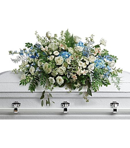 Tender Remembrance - Like wisps of clouds in a bright blue sky, this breathtaking spray of hydrangea, roses, and alstroemeria refreshes and inspires. A beautiful way to remember your loved one.