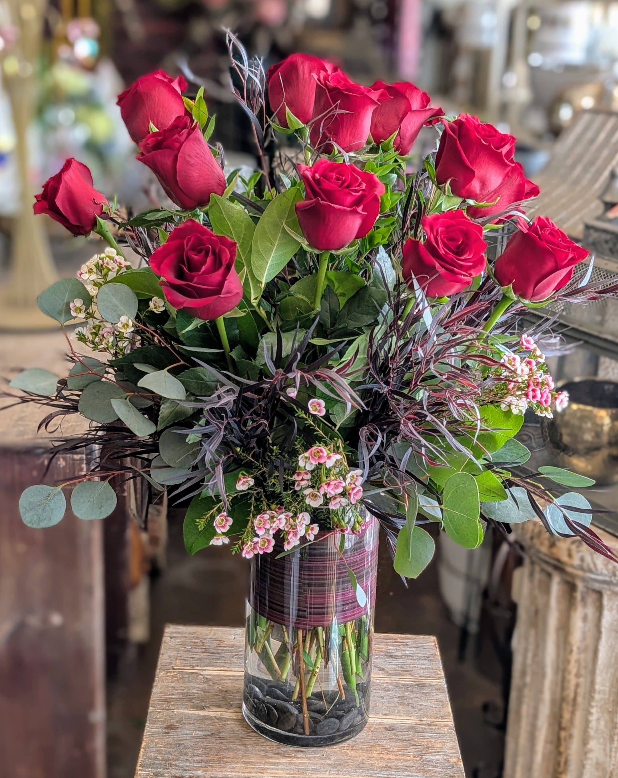 Bouquet of red roses in a clear glass vase