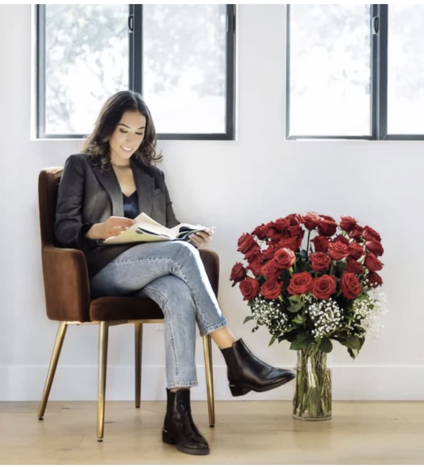 V Day Love - A dozen or more long premium roses are in the classy glass vases.