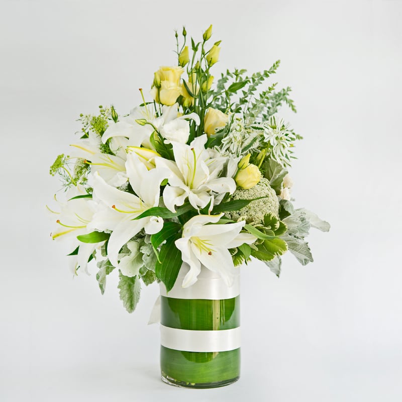 White and Grand - Fragrant casablanca lilies with hydraengeas, Lisianthus or roses and white filler flowers, some succulents etc.