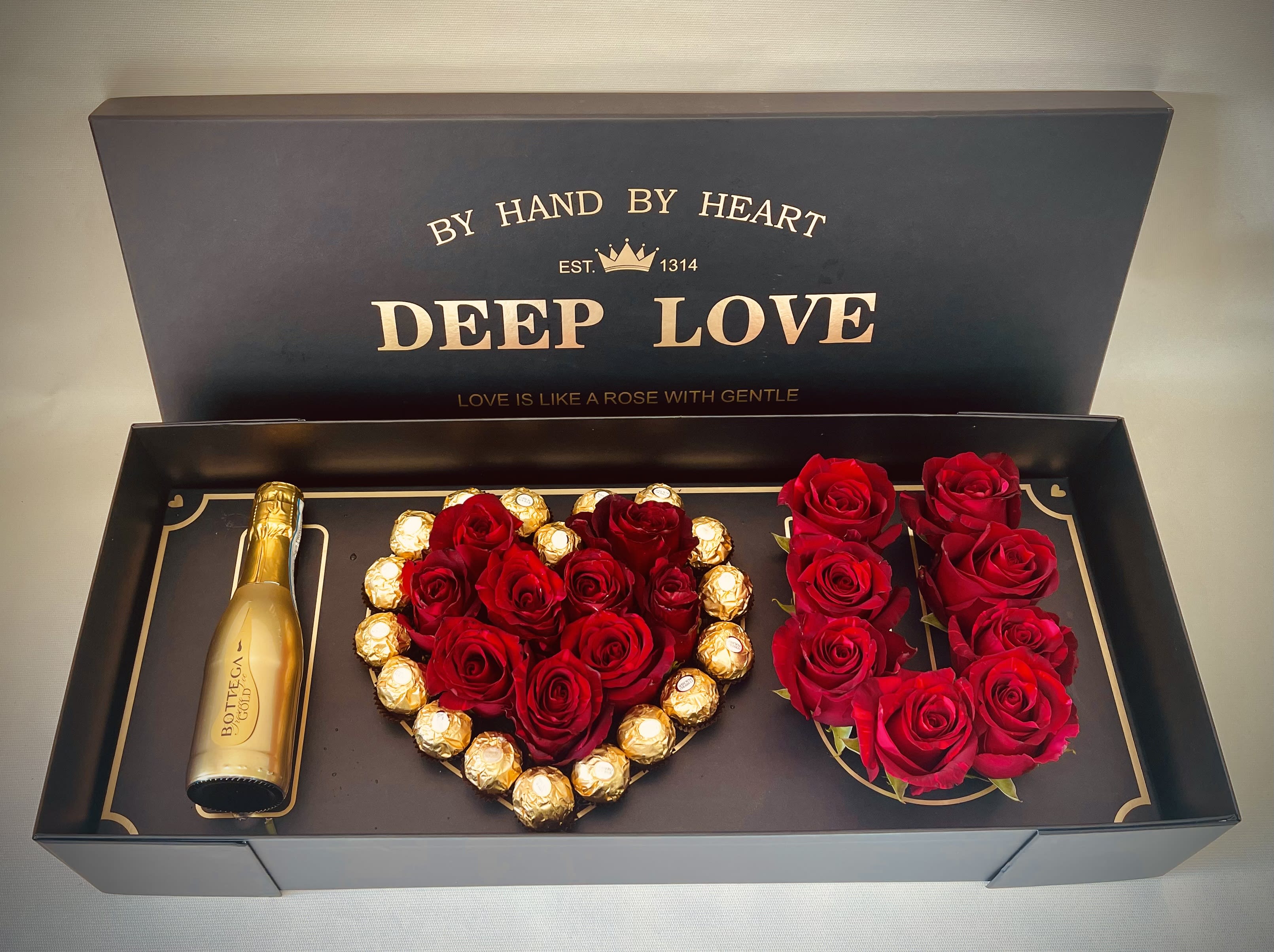 Prosseco love  - Mini Bottega Prosecco Gold and Ferrero Rocher chocolates with red roses forming "I Love You." Perfectly for Valentine's Day and Romance. Color could be change just specify in special instructions.