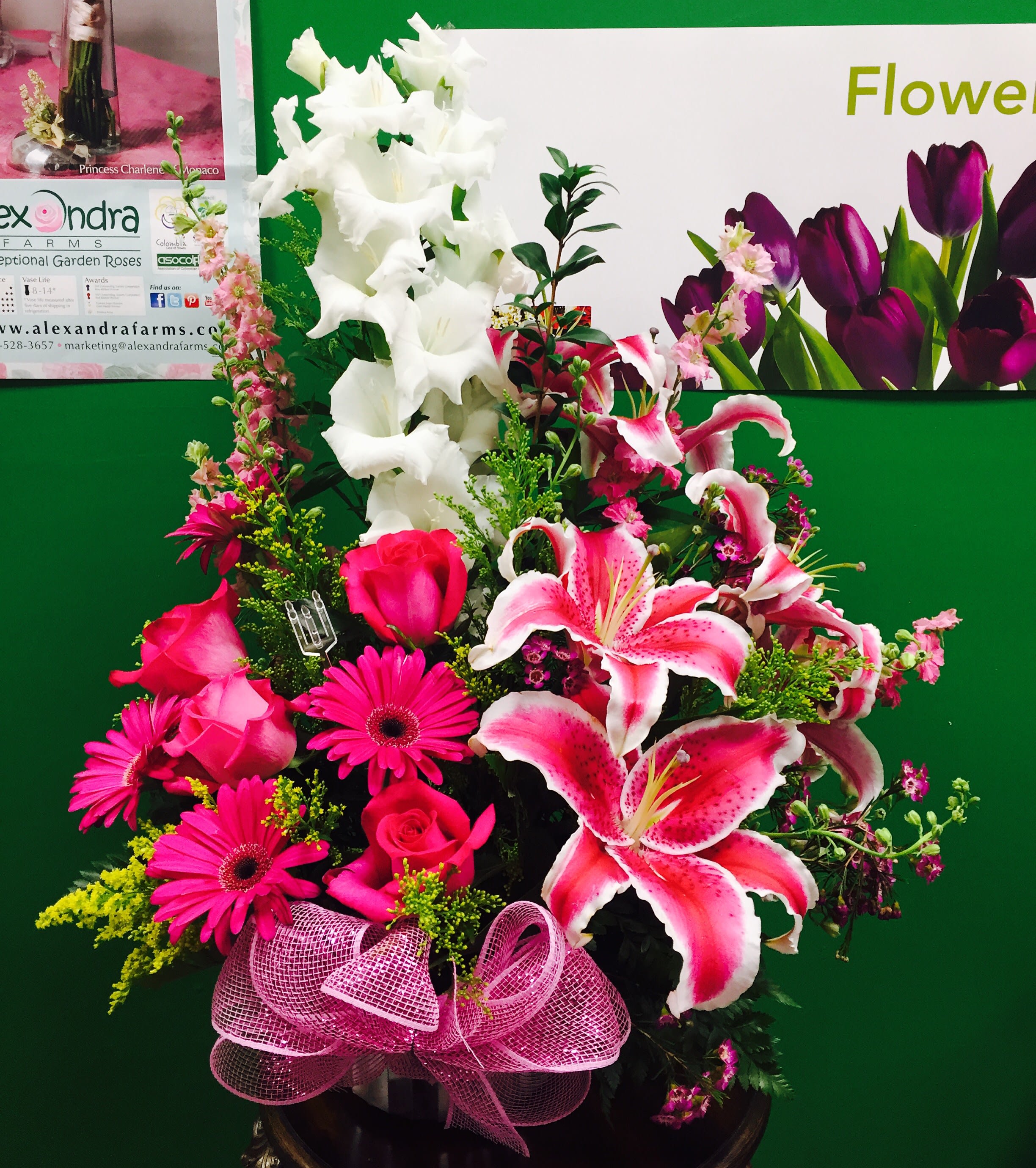 Pink and white mixed flower arrangement with lilies, roses, and gerbera daisies