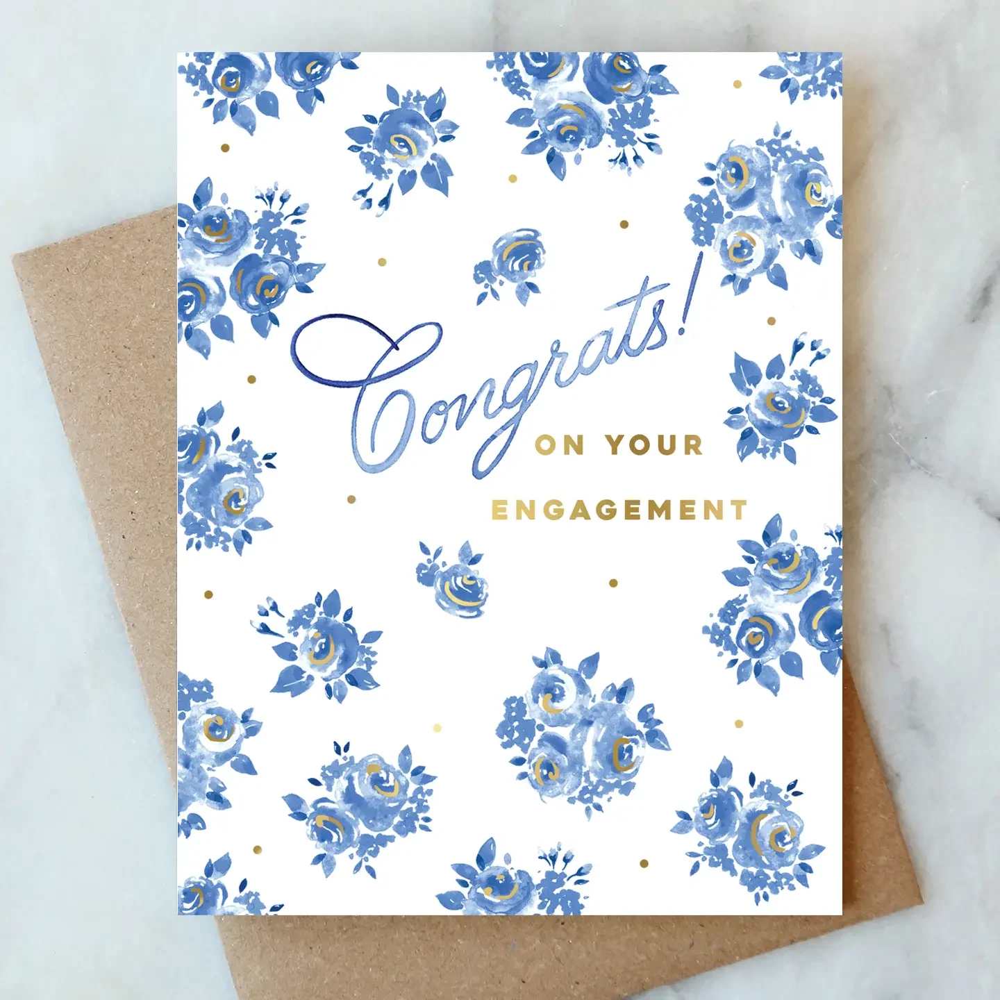 Engagement card with blue floral pattern and gold lettering