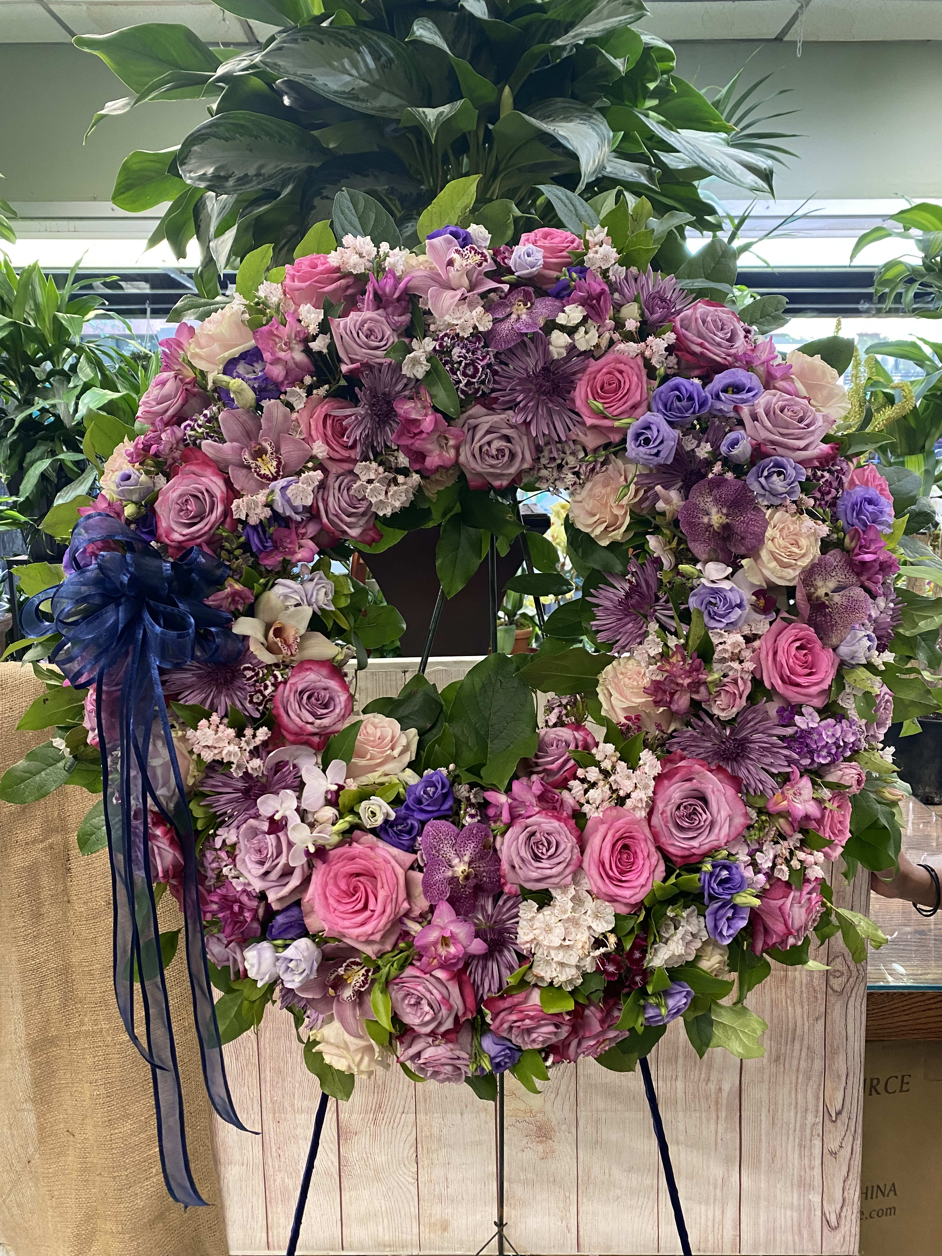 Purple Passion Wreath - Mix of all purple shades and some pink accents this wreath is an outstanding way to show your deepest symparhy