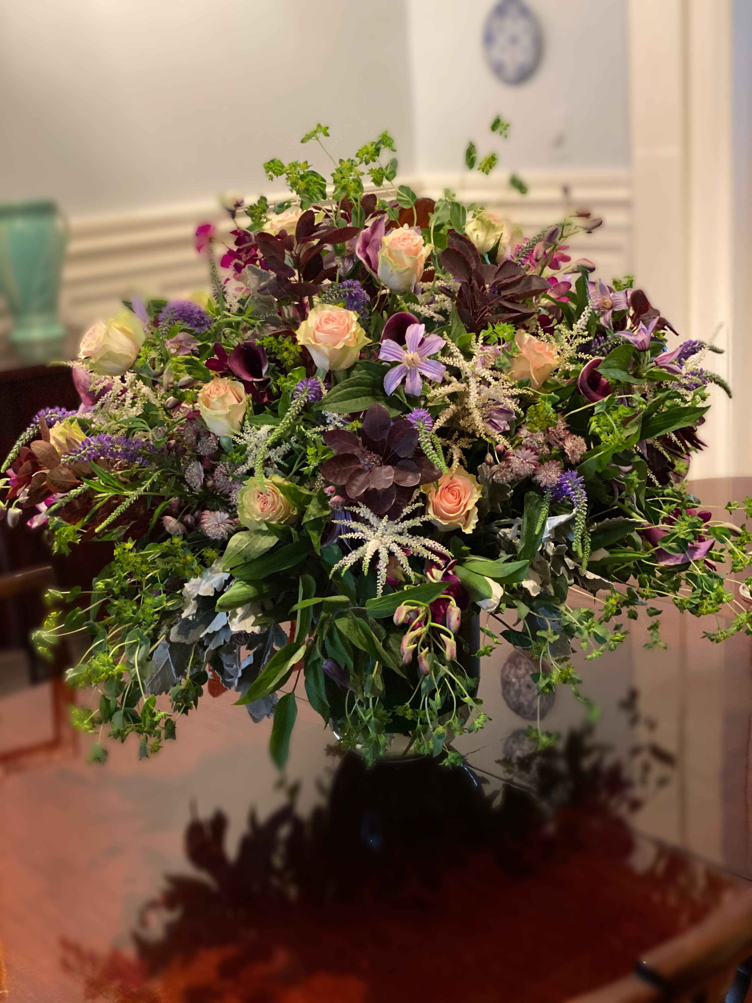 “European Dreams” - Overflowing blooms symbolizing grandeur and beauty has a flare of bounty and pleasure. The recipient will certainly be “wowed“ as The Tuscan Hills are delivered to their front door.  Availability of seasonal flowers may vary depending on the time of year. Please note that certain flowers and fillers may need to be substituted while maintaining the integrity of thIs beautiful show stopper.
