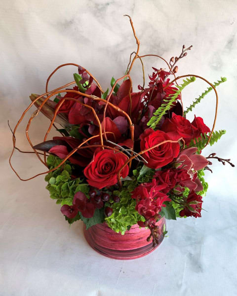Happy Valentines Day - Red roses, hydrangeas and lilies make this arrangement extra a special for the holiday! 