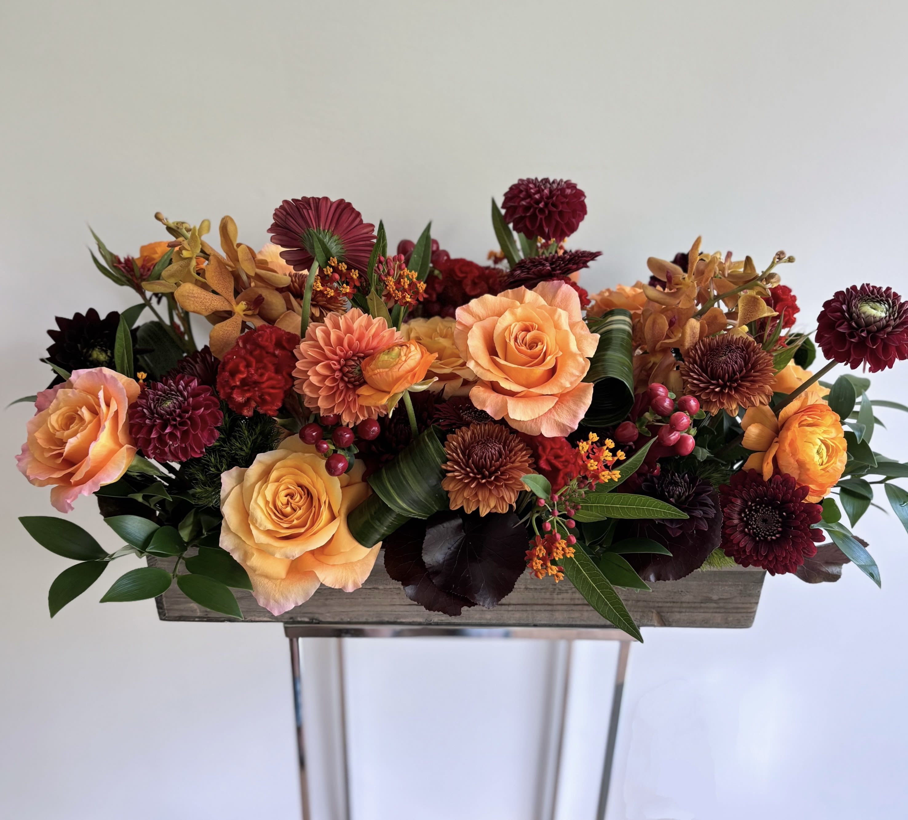 Autumn Highlight - Gorgeous centerpiece set in a 20 inch long wood planter with premium seasonal flowers in autumn colors. A perfect gift and piece of home/office decor for Fall and Thanksgiving.
