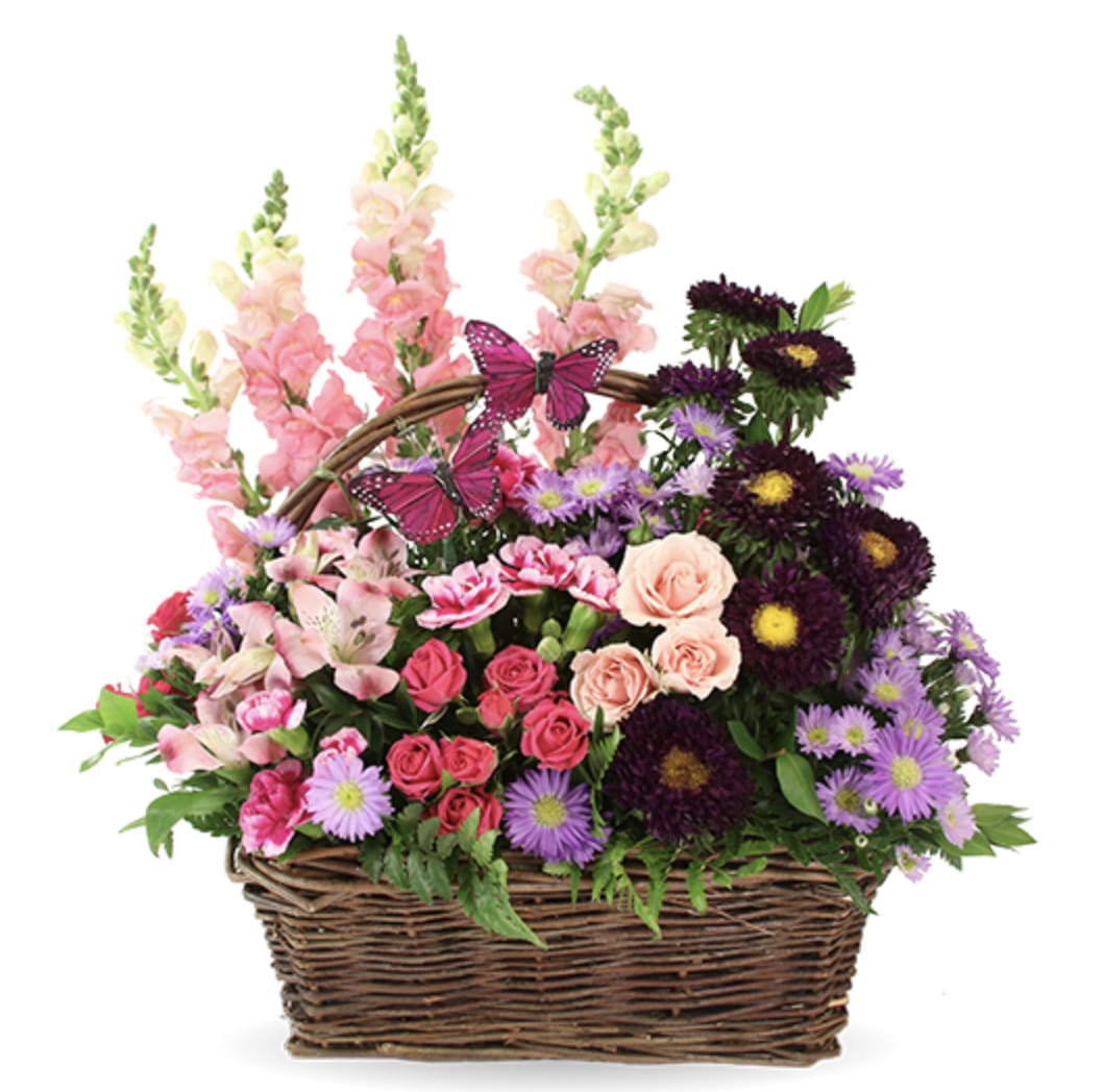 Mixed flower basket with pink, purple, and peach blooms and butterfly accents