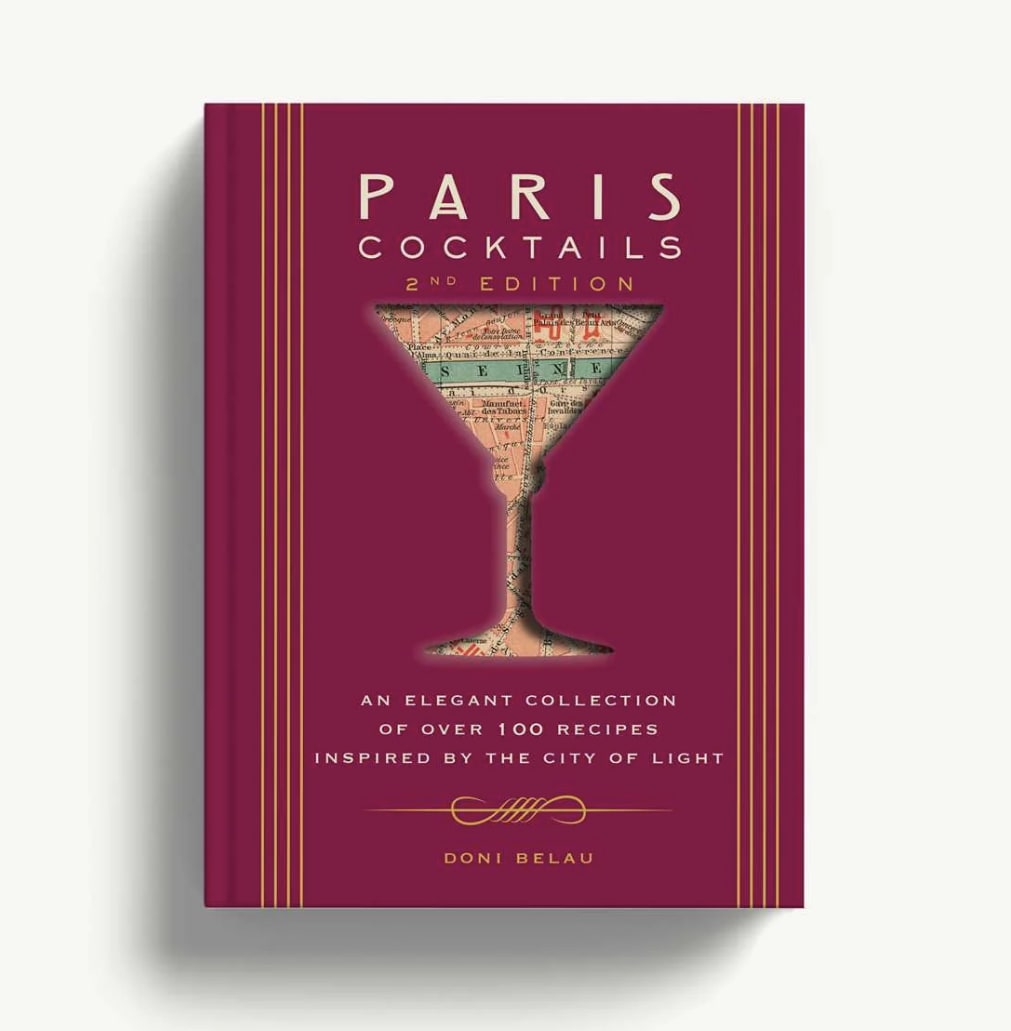 Magenta cocktail recipe book with a martini glass graphic