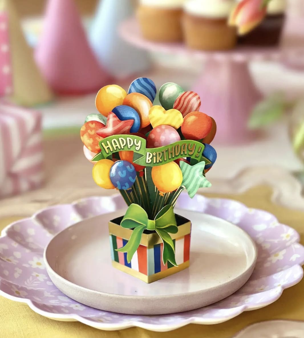 Mini birthday balloon bouquet in a striped gift box