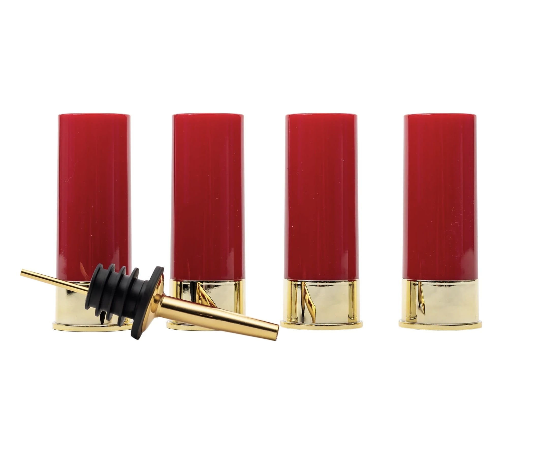 Four red and gold bottle stoppers with one stopper lying in front