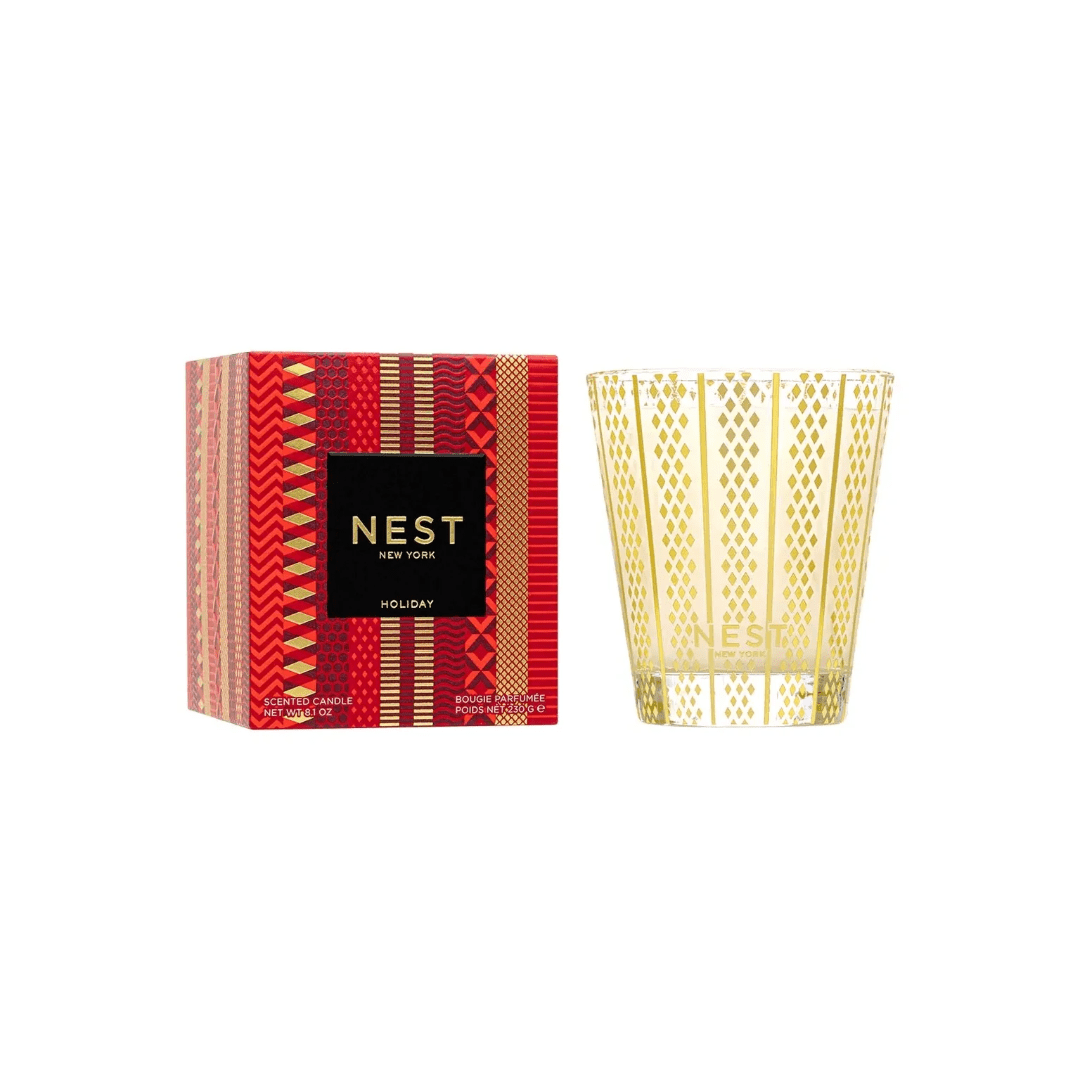 Nest New York holiday candle with patterned box and glass tumbler