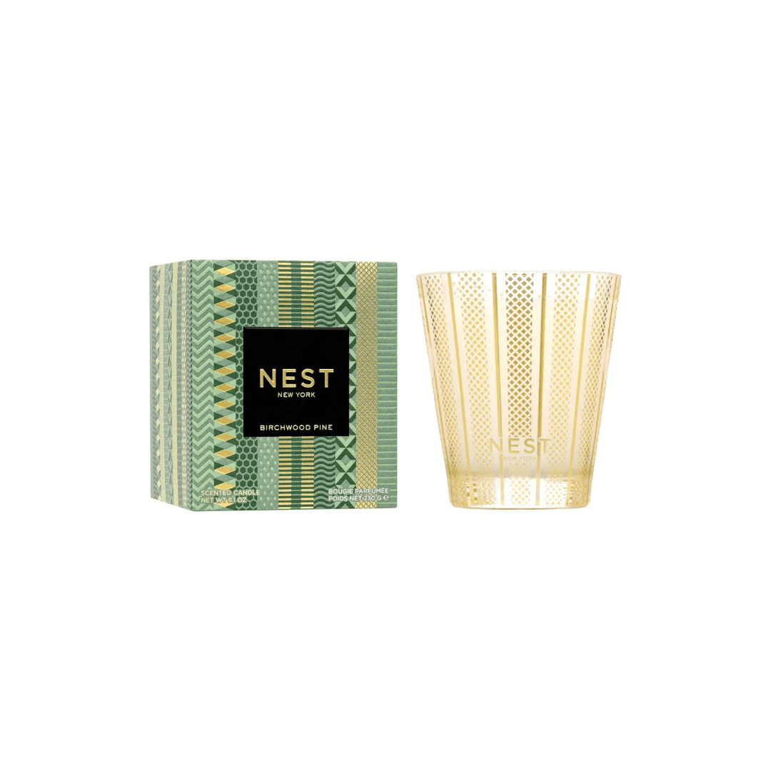 Decorative scented candle with patterned box and gold glass holder