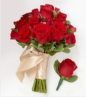Red rose bouquet with a satin ribbon and matching boutonniere