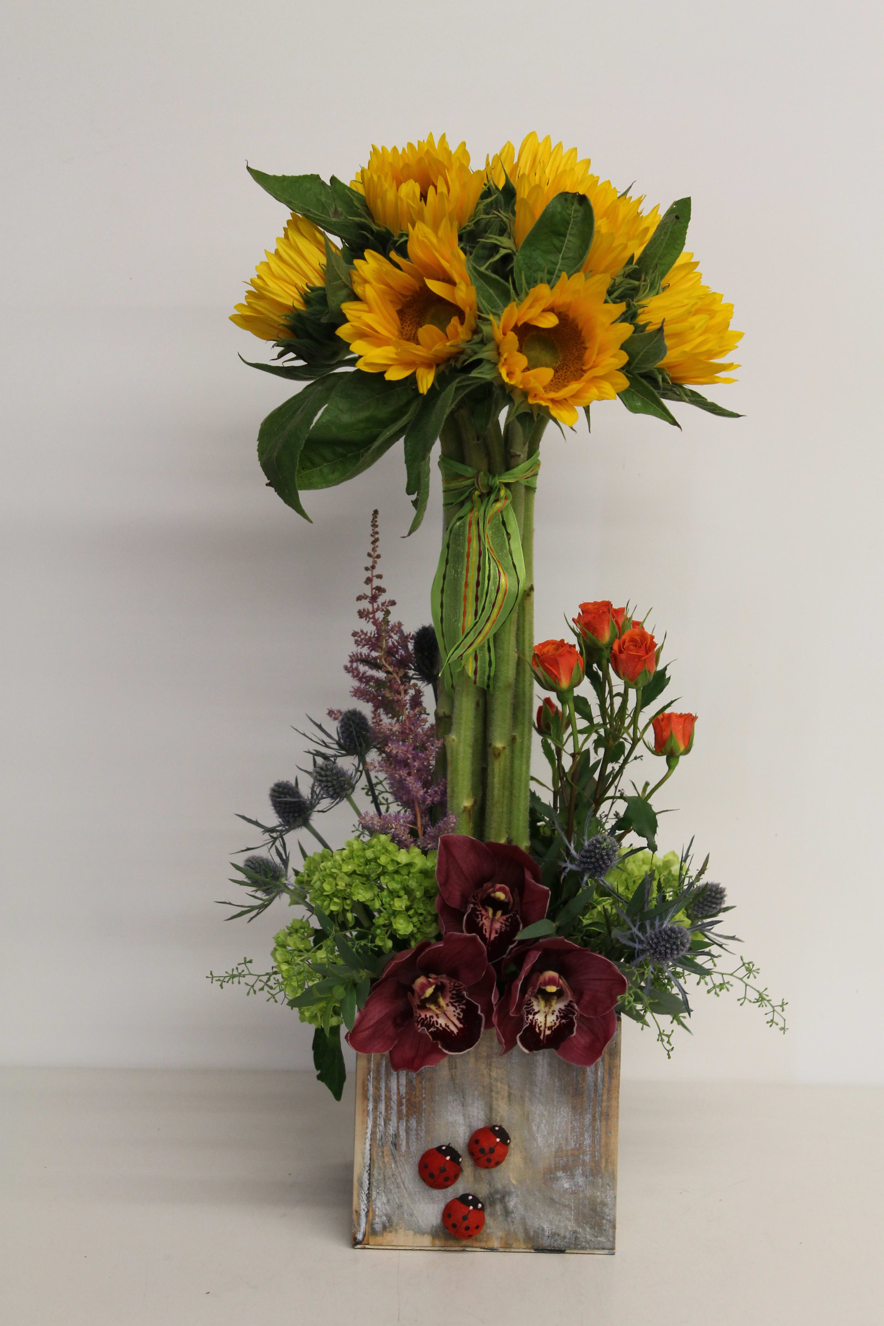 Rise and Shine/26 - Sunflower, Orchid, Spray Rose, Astilbe, Hydrangea and sea Holly