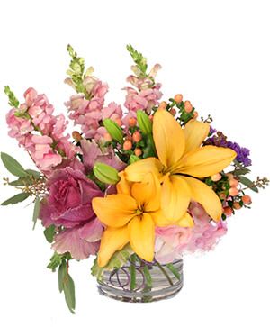 Entranced Meadow - Delightful and unique, this bouquet is a breath of fresh air. The gorgeous peach Asiatic lilies stand out beautifully against the lovely pink hydrangea, pink and lavender snapdragons, and purple ornamental kale, making Entranced Meadow a charming mix. Send this serene beauty to someone you love today!