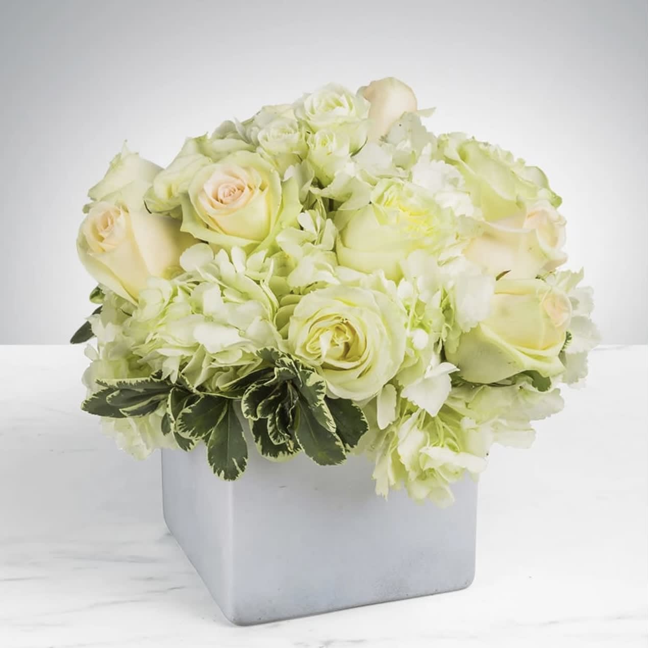 Simplicity - Simplicity at its finest and 100% elegant! This bouquet is the perfect gift to wish a happy birthday, show gratitude, wish a speedy recovery, celebrate an anniversary or congratulate a newly wed couple on their special day.   Approximately 9" D