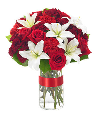 Elegance Bouquet - The essence of gracefulness is captured memorably in this wonderful bouquet that combines red roses, white Asiatic lilies and red carnations. Adding to the elegance are a stylish glass container and a bright red satin ribbon. Small Measures 14"H by 12"L. Medium Measures 15"H by 13"L. Large Measures 16"H by 14"L.