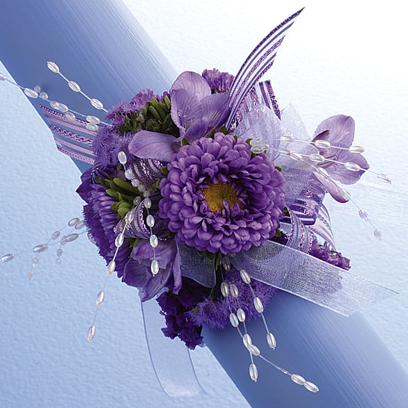 Purple floral bouquet with ribbon and beaded accents