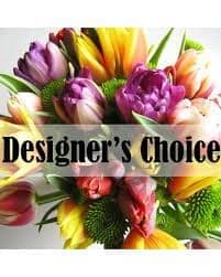 Colorful tulip bouquet with a "Designer’s Choice" banner