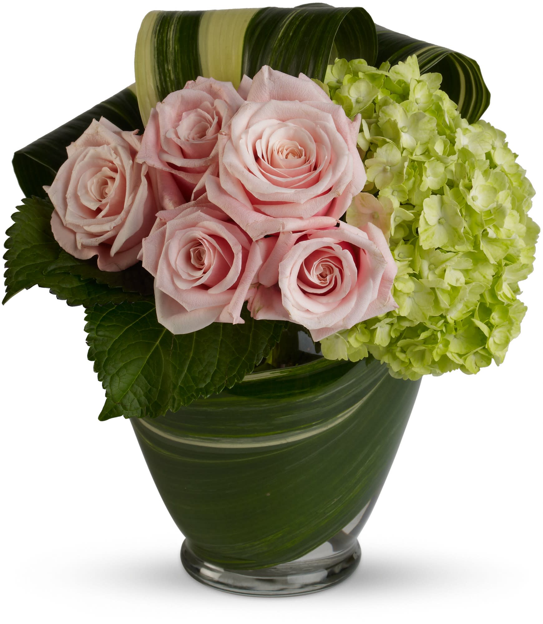 Pink roses and green hydrangea in a glass vase